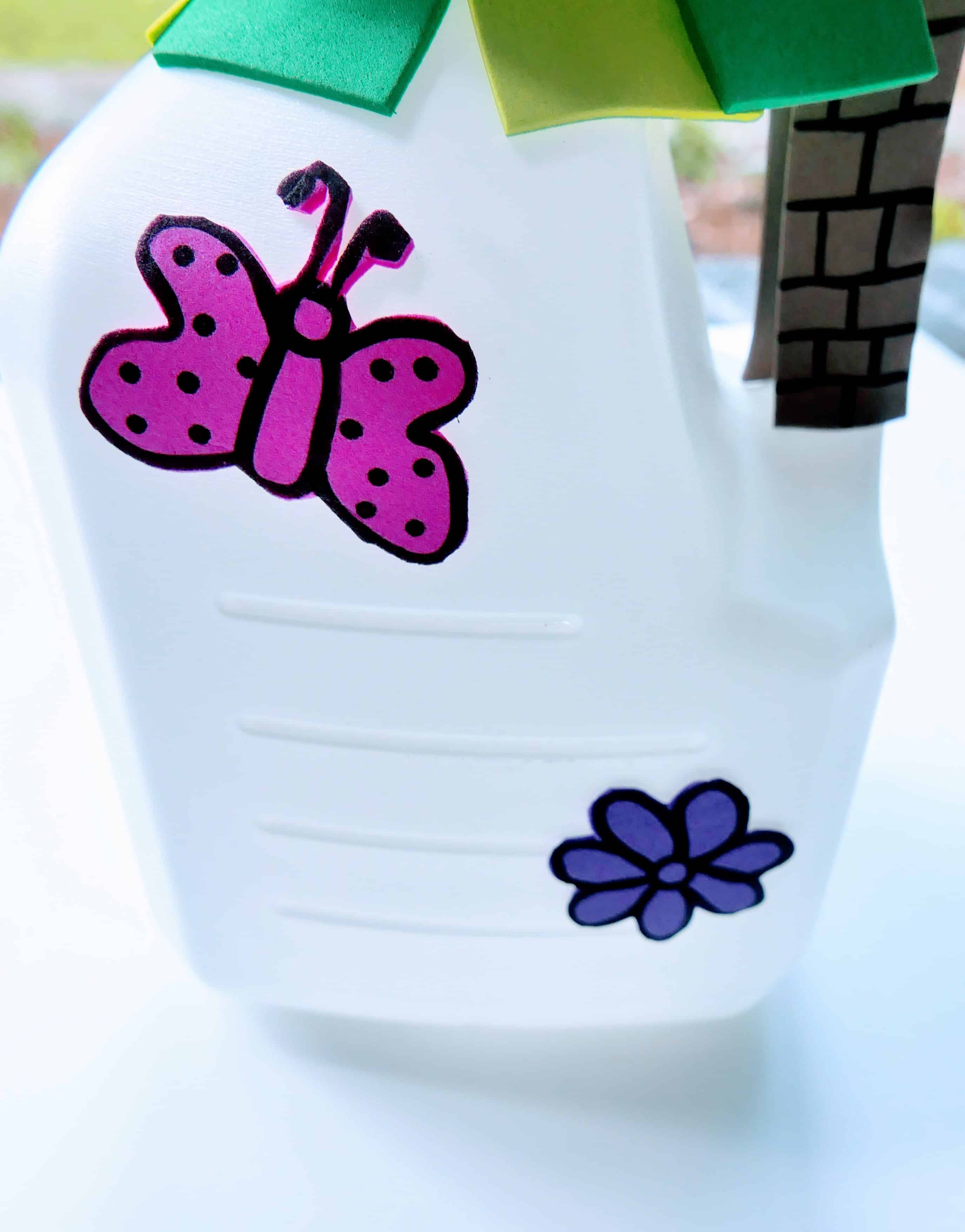 Milk jug with colorful decorations