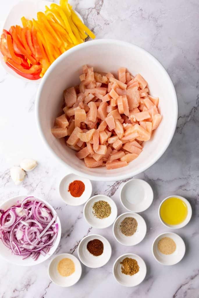 Arranged ingredients on a white table top.