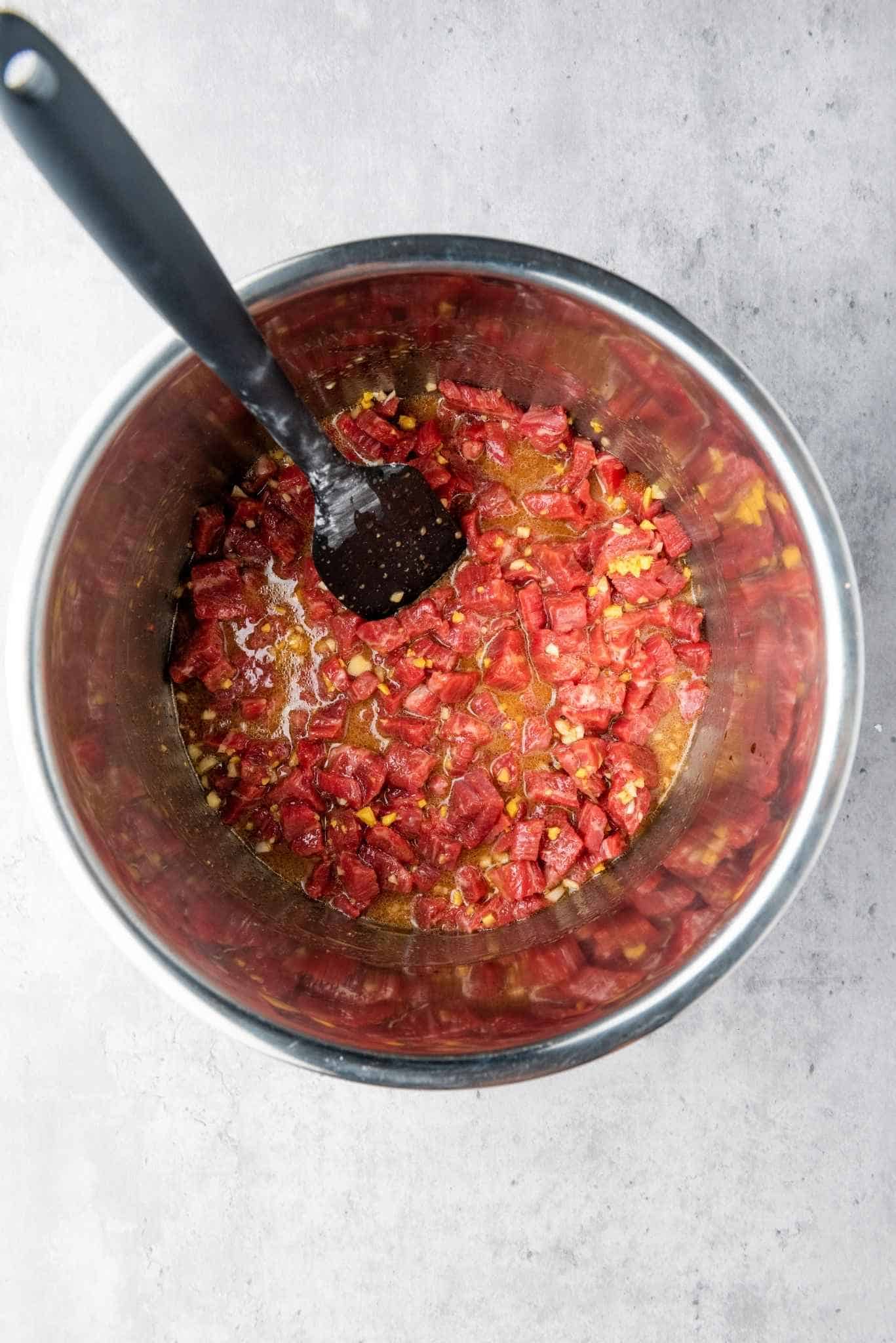 Mixed ingredients in a cooker.