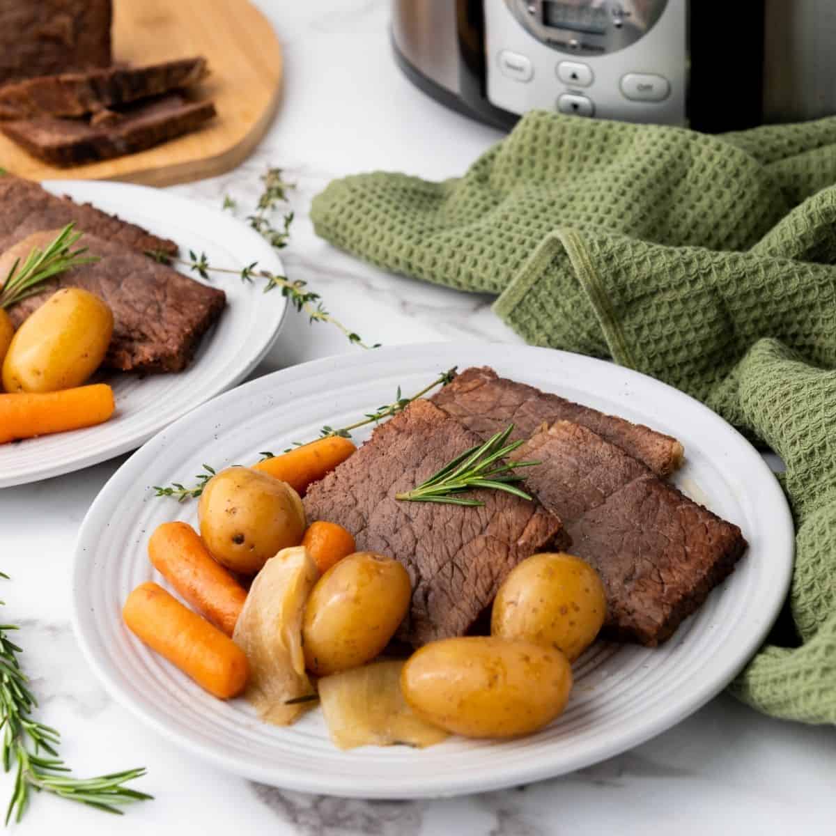 Rump roast served with vegetables.