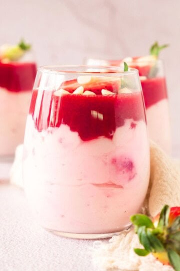 Three glasses of strawberry mascarpone mousse.