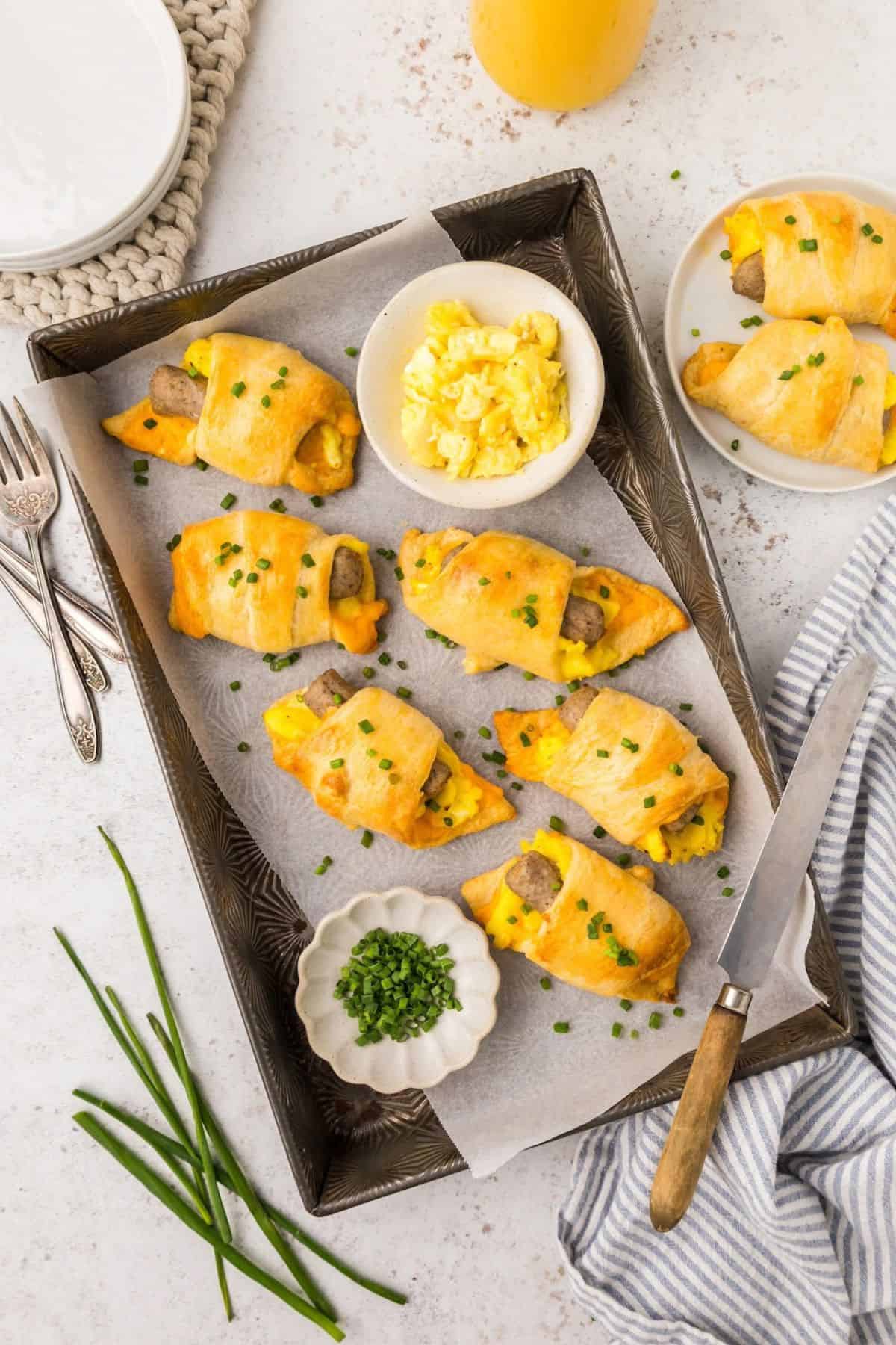 Group of crescent rolls being served and decorated.