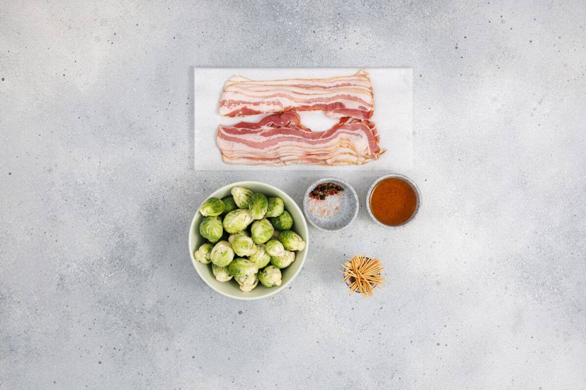 Ingredients for maple Glazed bacon wrapped, arranged neatly in the surface.