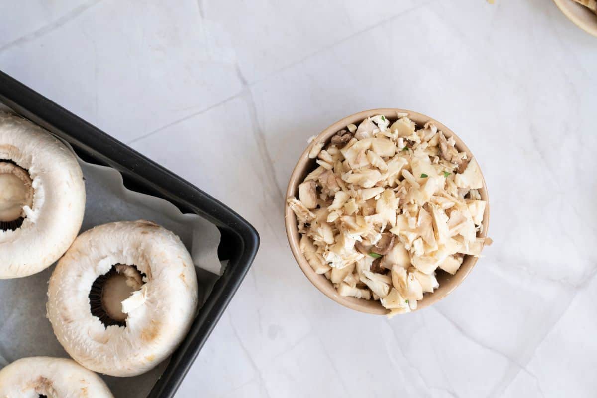 Finely chopped stems in the small bowl.