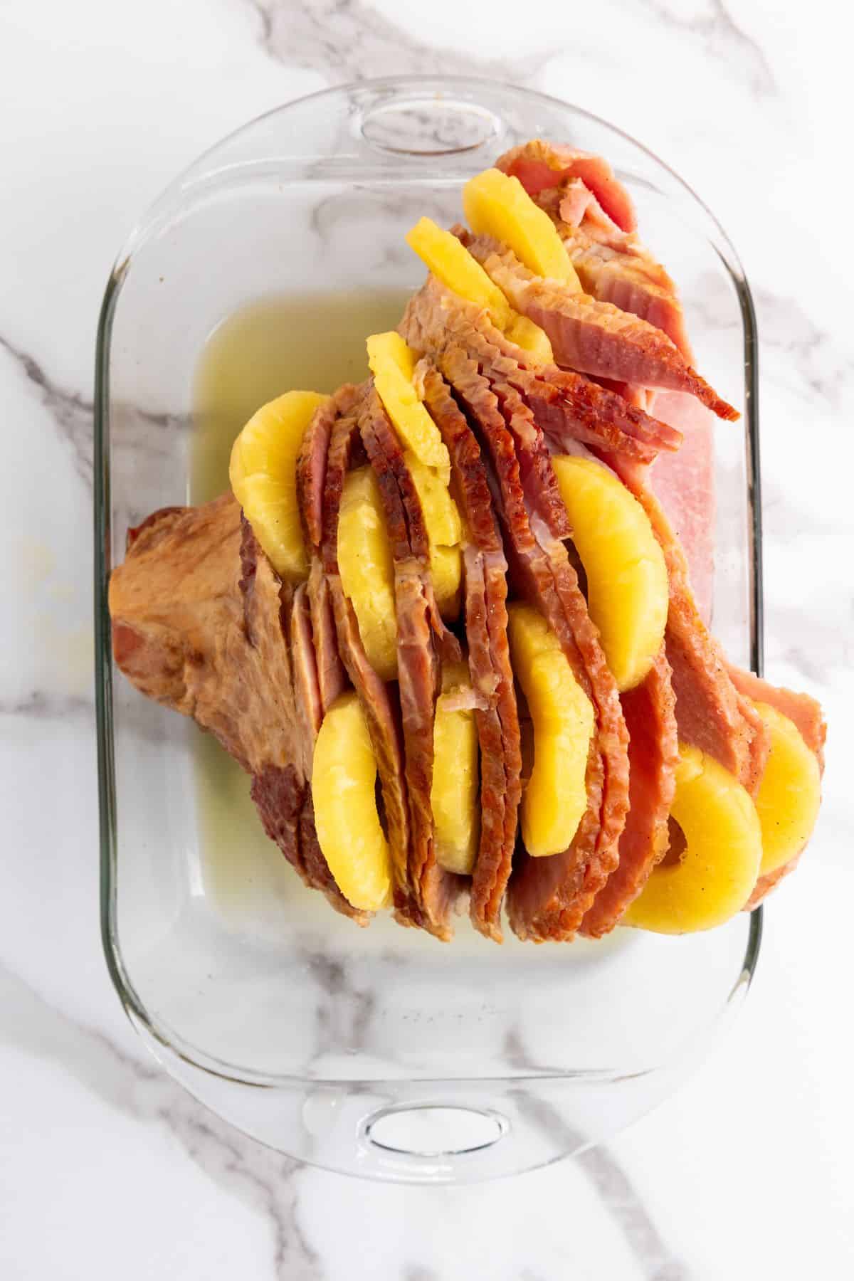Slices of ham with pineapple on top, soaked in sweet pineapple juice.