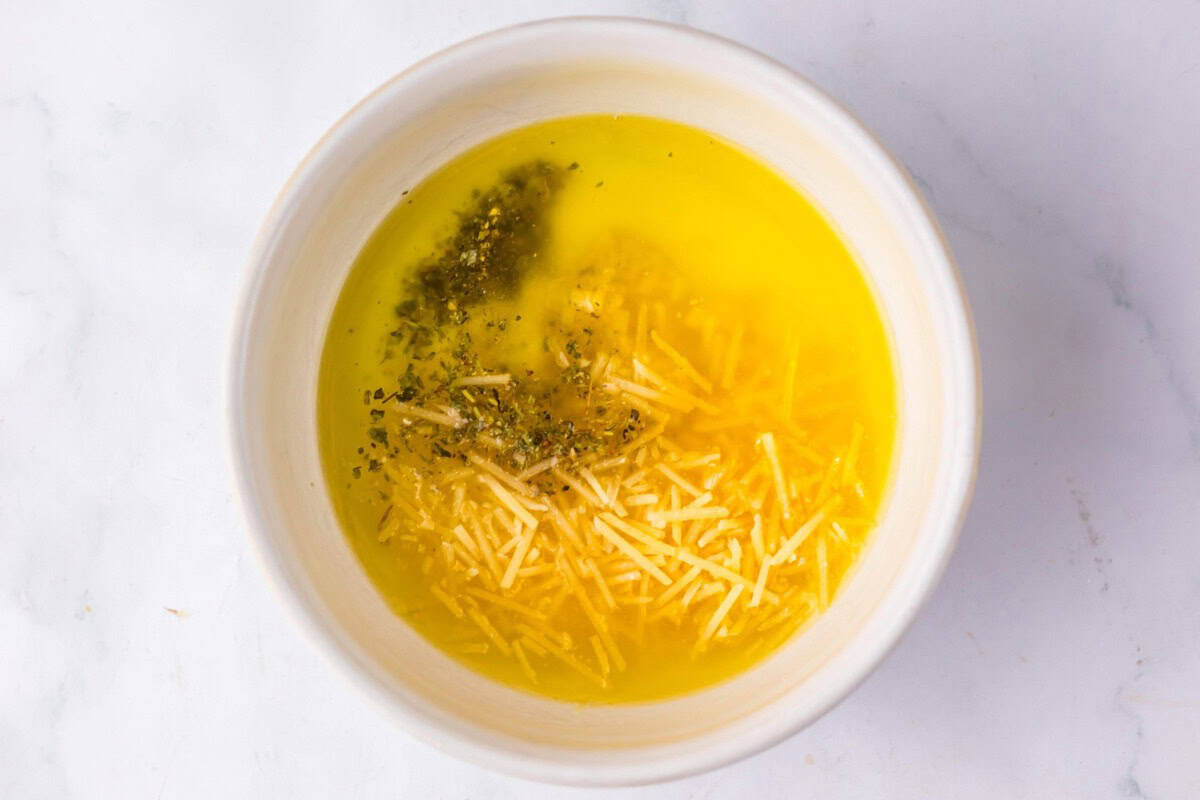 Small bowl with ingredients being mixed together.
