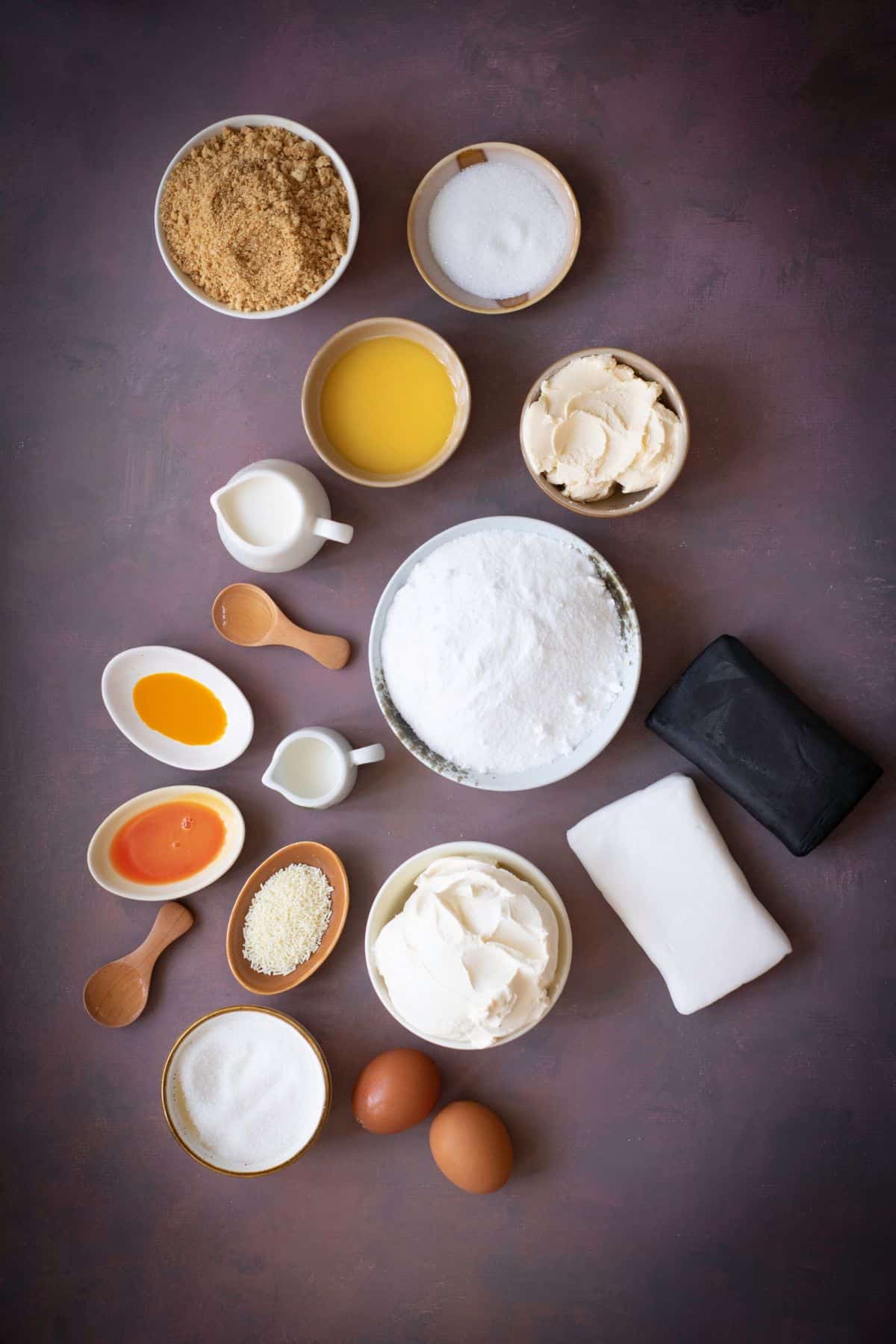 Cheesecake ingredients arranged neatly on a flat surface.