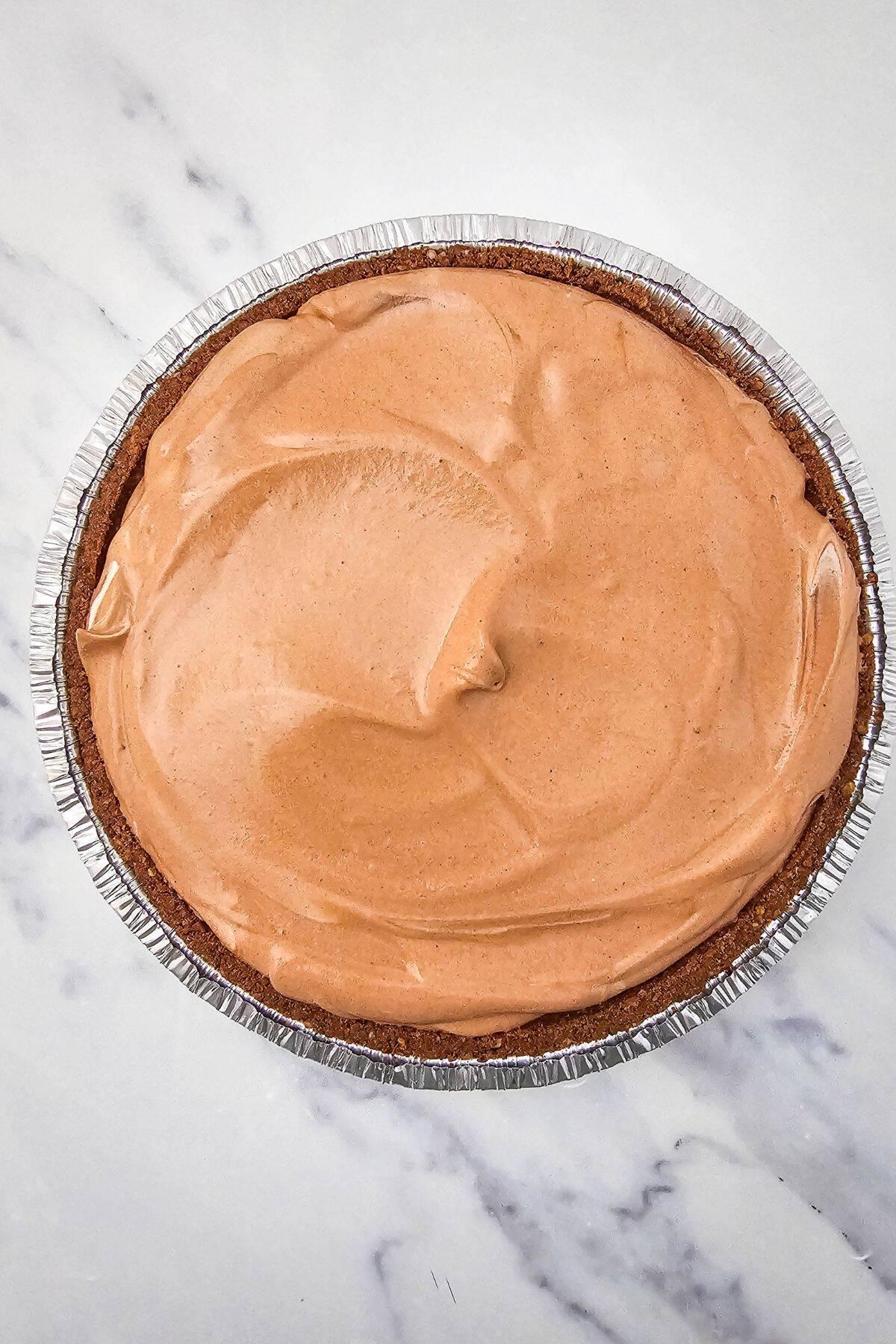 Chocolate pie with a chocolate crust topped with a rich chocolate filling.