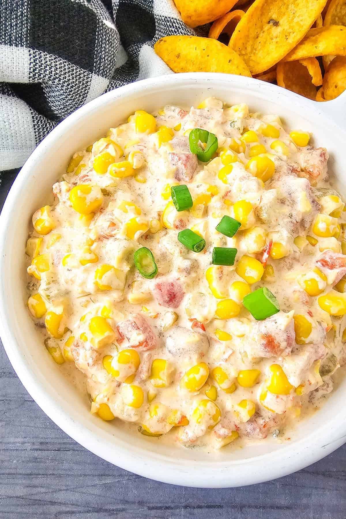 A bowl of creamy corn dip.