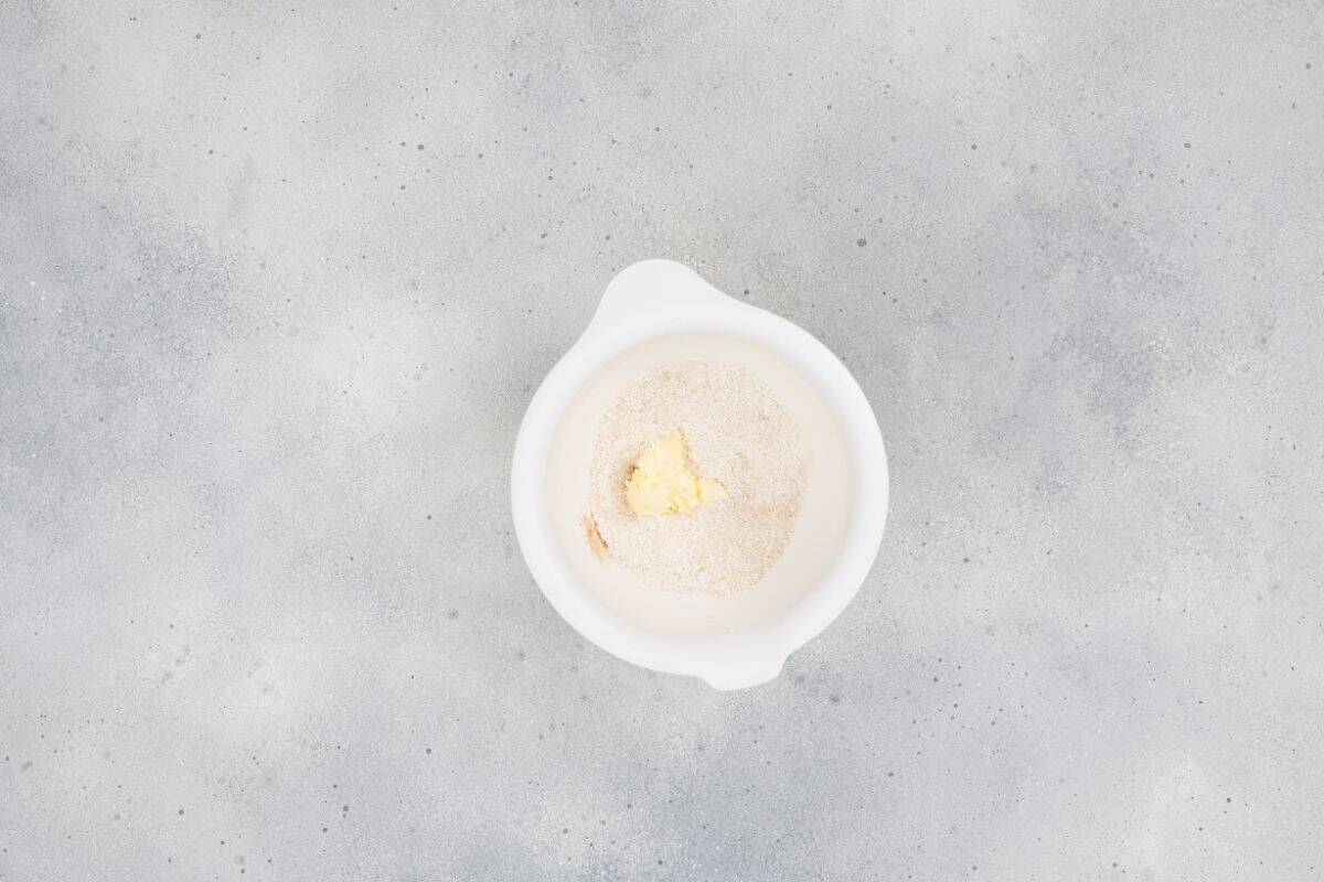 Dry ingredients being mixed together in a bowl.