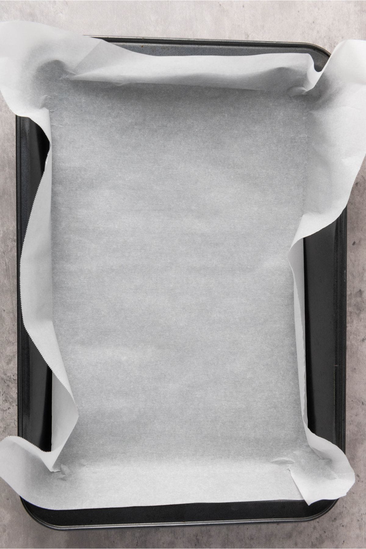 A baking tray with parchment paper.