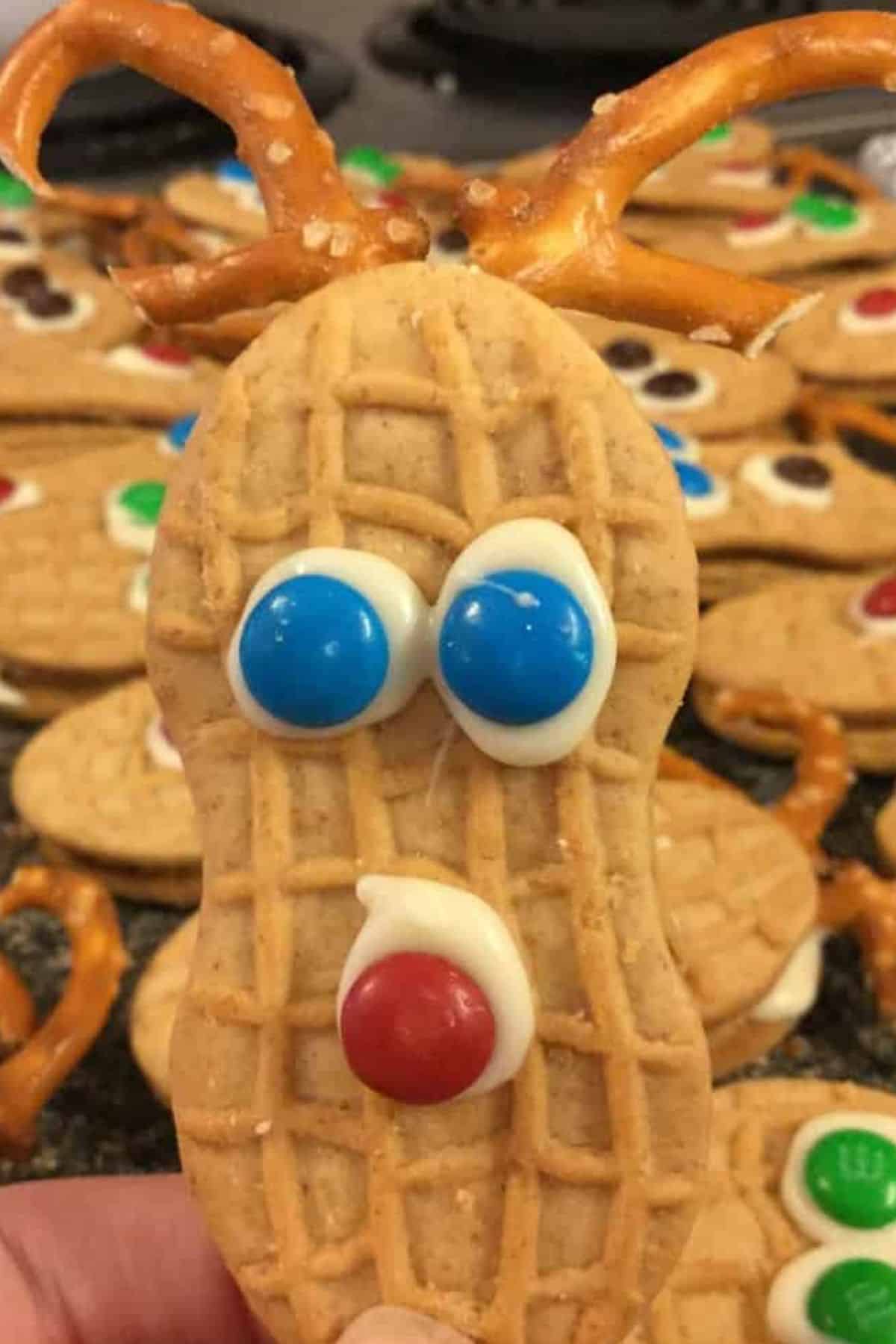 Close-up of Nutter Butter cookies with many more cookies visible in the background.