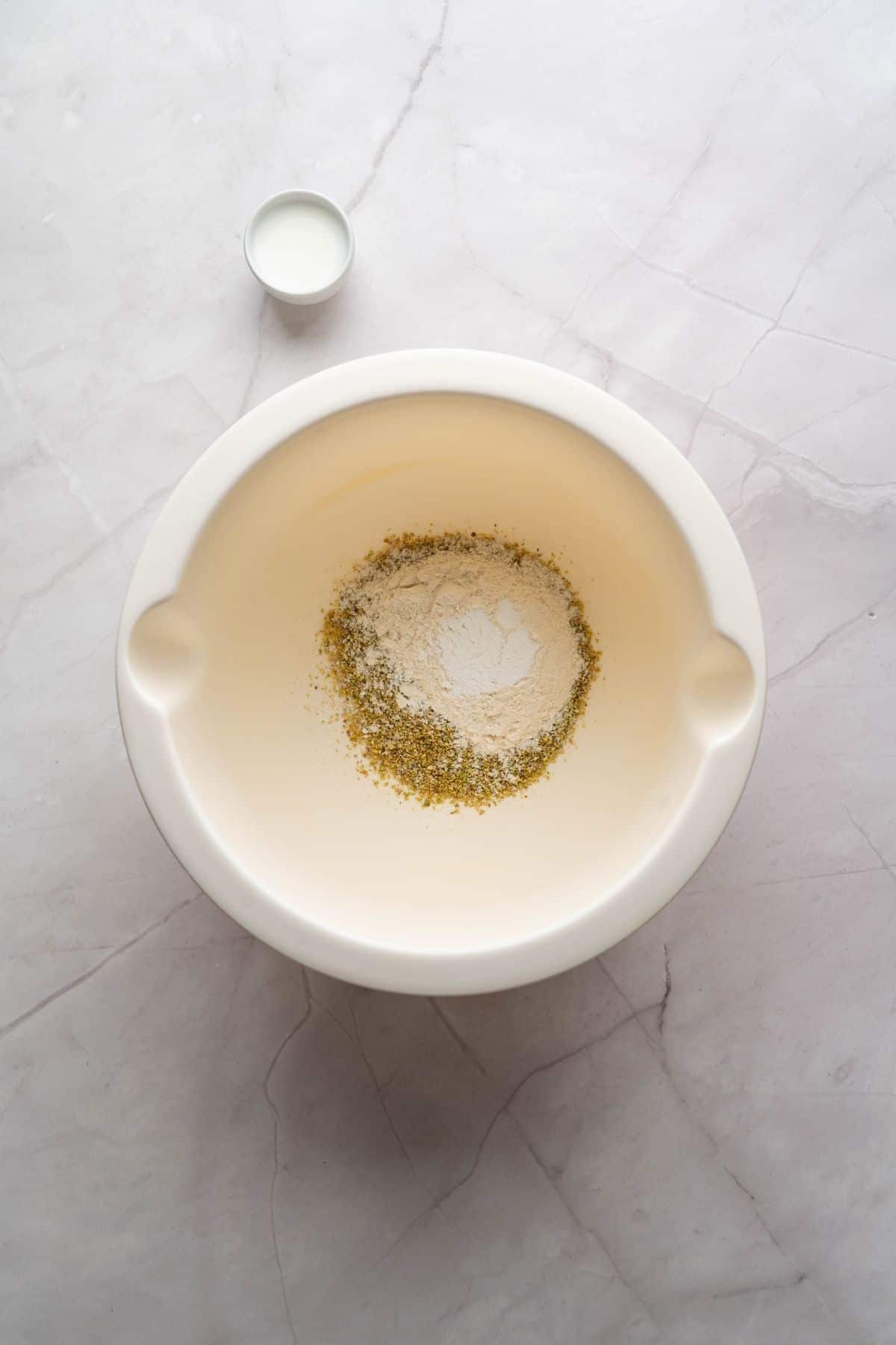 Ingredients being mixed in a bowl.