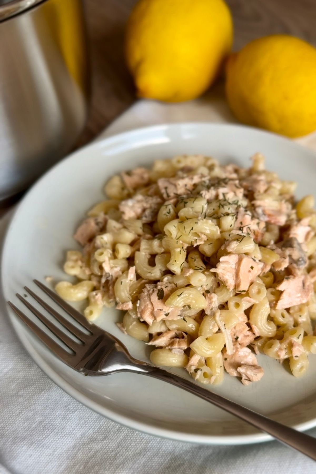 Creamy Dill Salmon Pasta served on a plate with a fork.