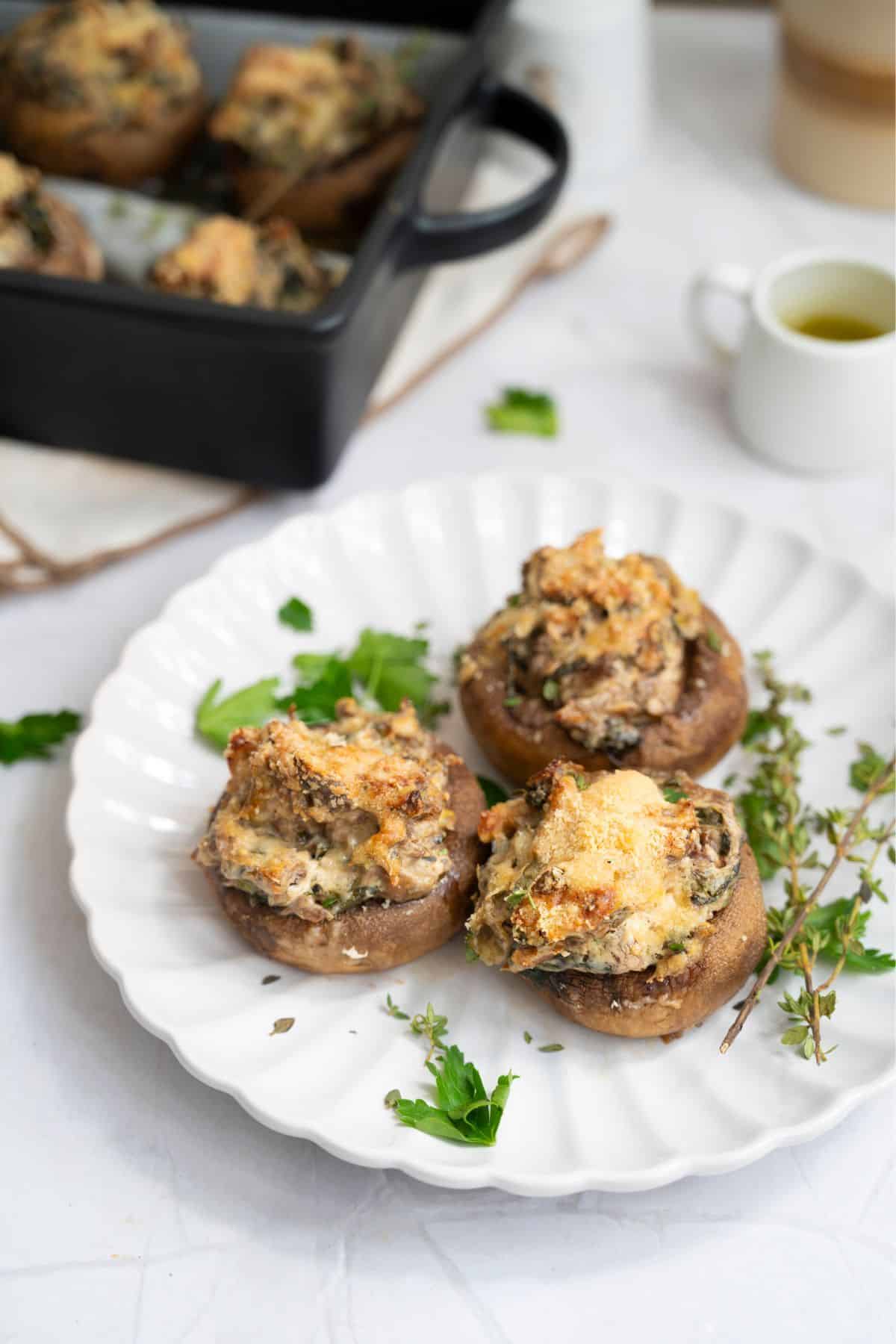 Delicious baked portobello mushrooms stuffed with cheese, herbs, and savory ingredients, perfect for a flavorful vegetarian meal.
