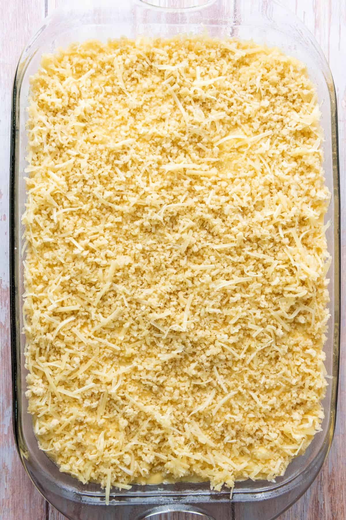Creamy cheese topping baked to perfection in a glass dish.