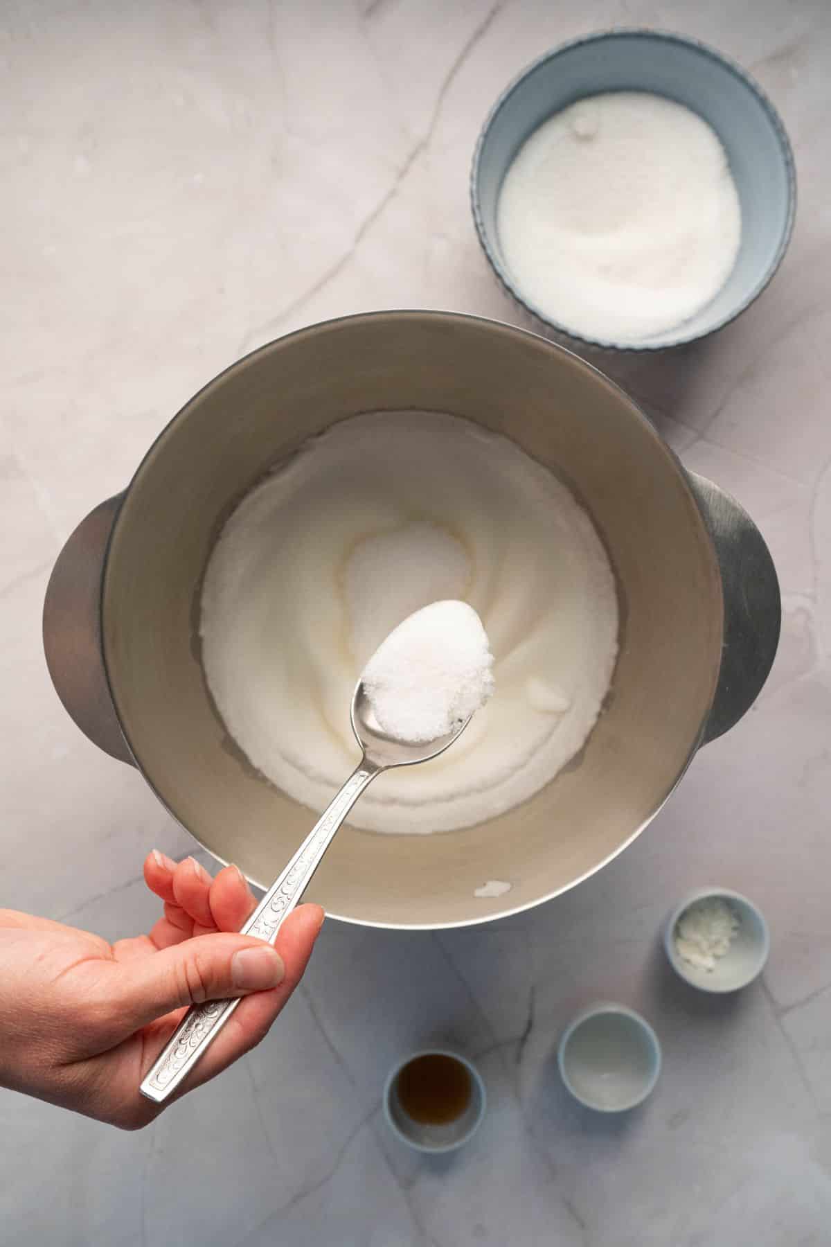 Delicious baking ingredients with powdered sugar, eggs, and liquids ready for mixing.