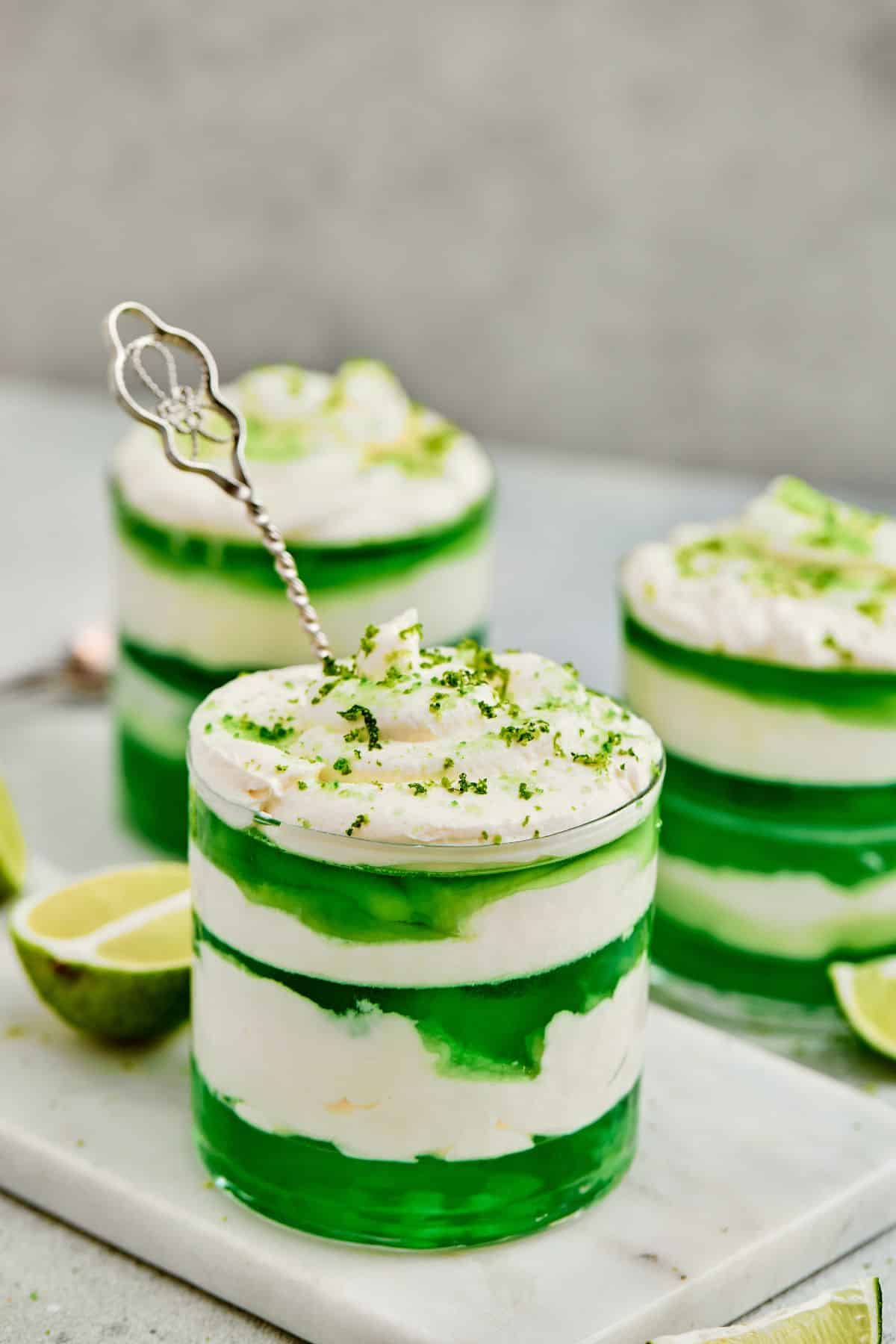 Delicious creamy green lime ice cream with lime slices, perfect for St. Patrick's Day celebration.