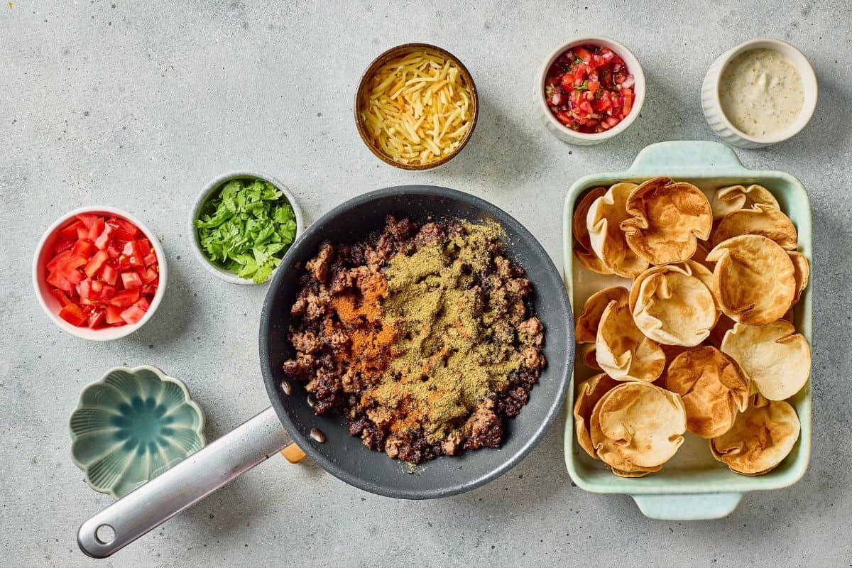 Fresh taco toppings with seasoned ground beef and crunchy tostadas.